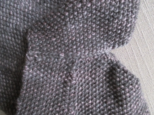Here's the inside shoulder seam - three needle bind off in seed stitch.
